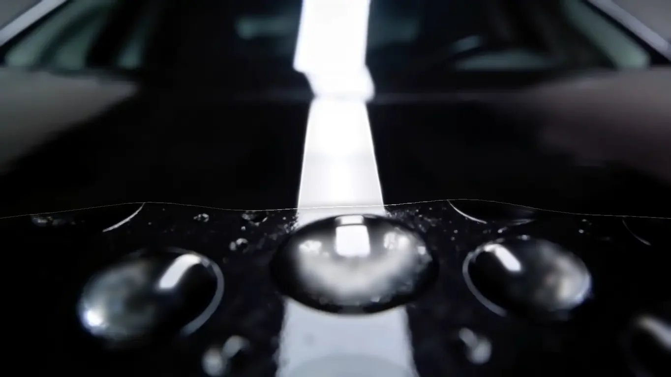 Water sheeting off the hood in one pull.